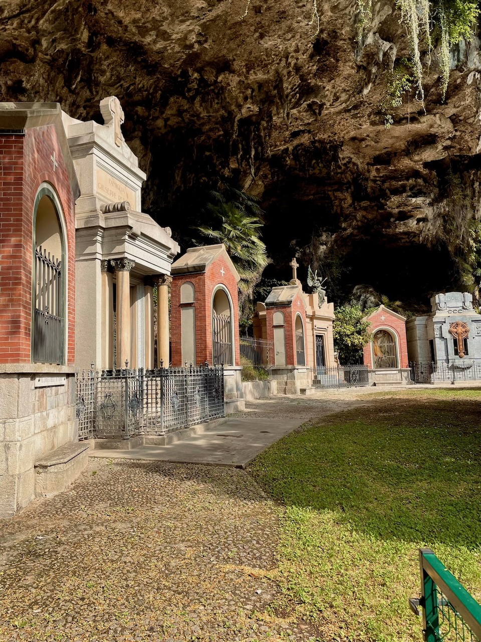 Historic mausoleum structures set inside a cave